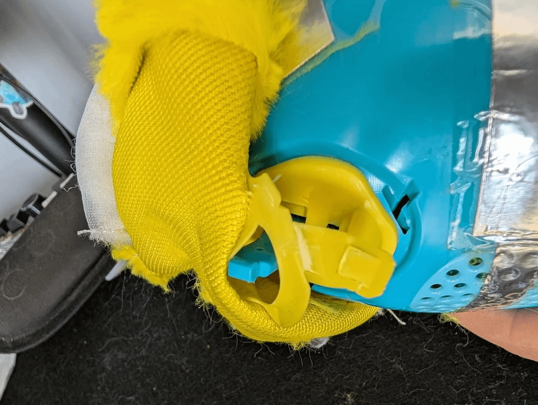 Detail of the Furby ear tab after removal