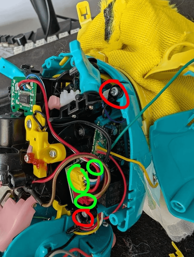 Right side Furby plugs and screws marked