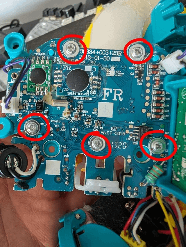 Five PCB screws marked on the Furby eye board