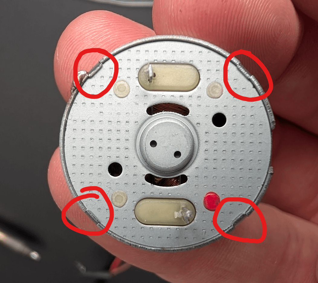 Four motor bottom plate clips marked in red